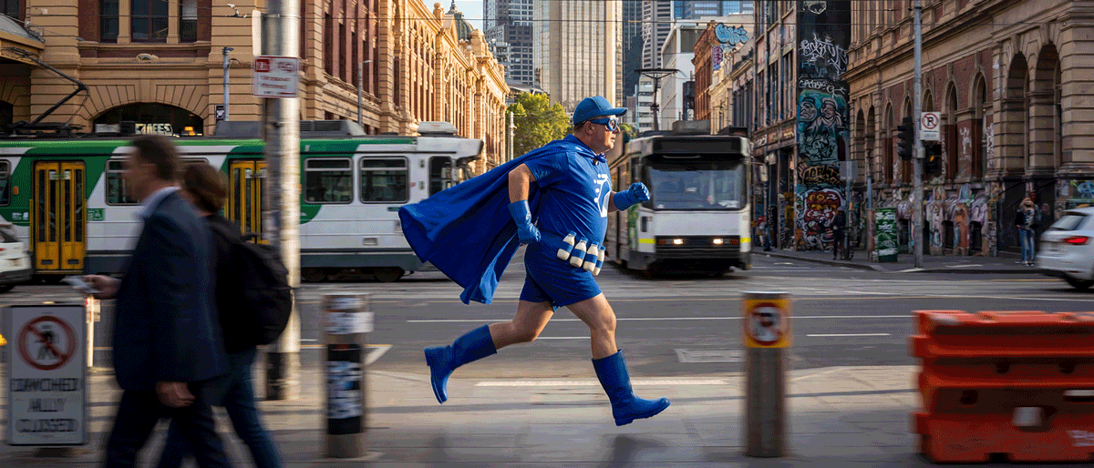 A runner, mid-stride, cut against himself.